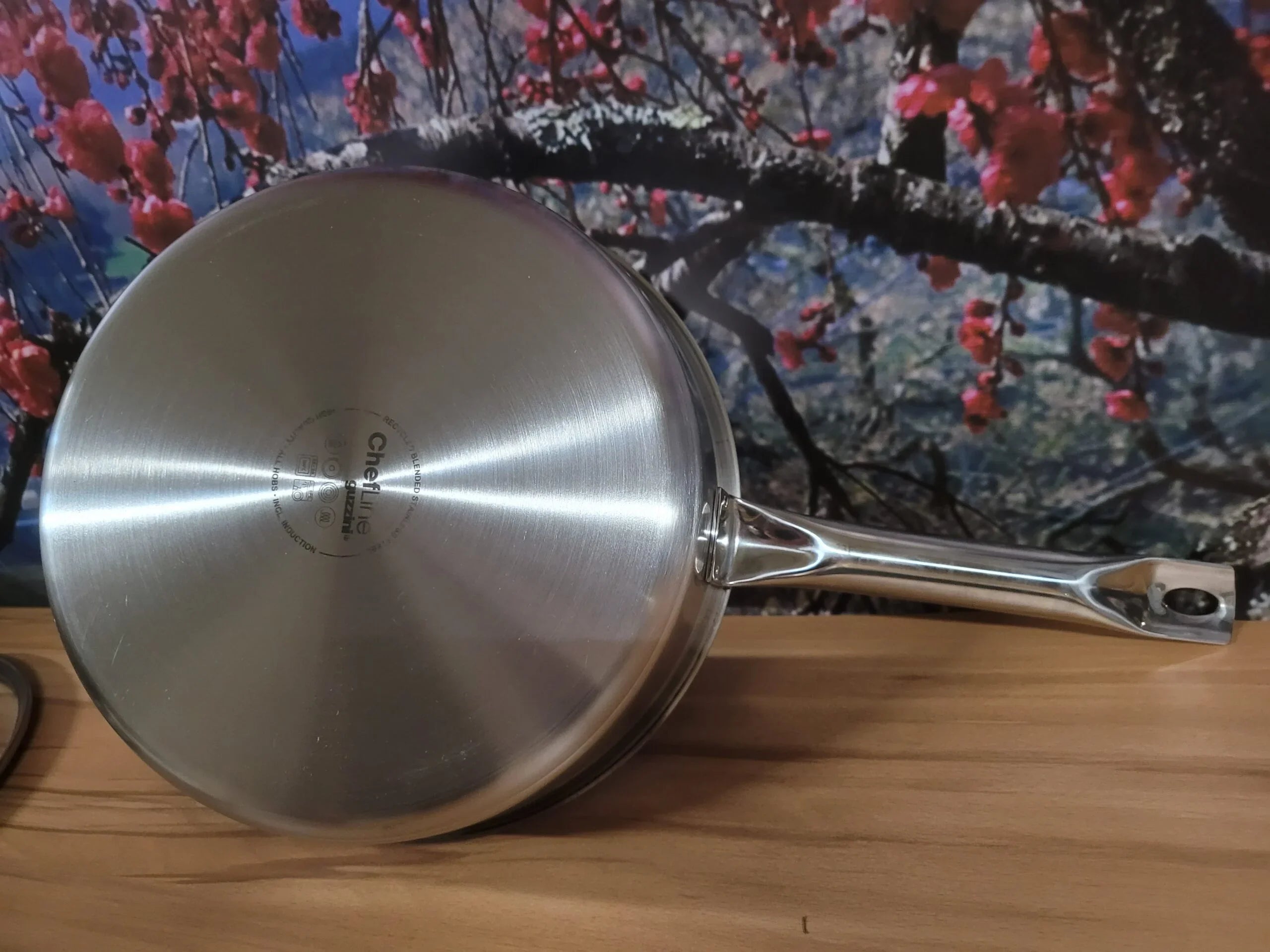 Тиган със стъклен капак Guzzini D 24 cm неръждаема CrNi 18/10 стомана, вместимост 2,5 литра